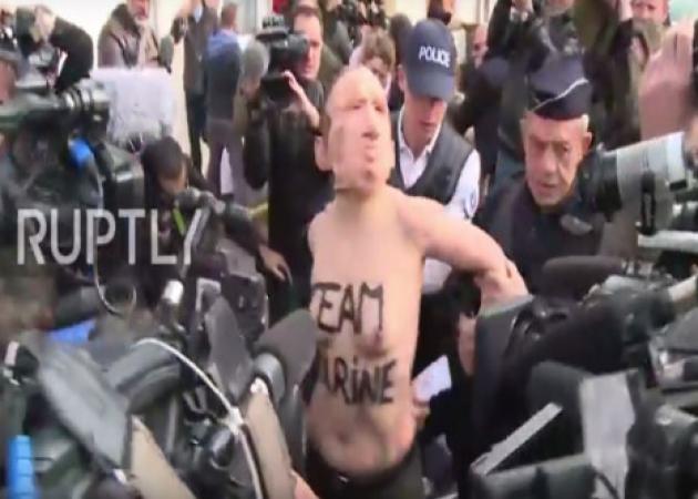 Γαλλία – Εκλογές: Γυμνές ακτιβίστριες της FEMEN με μάσκες του Πούτιν πριν ψηφίσει η Λε Πεν!